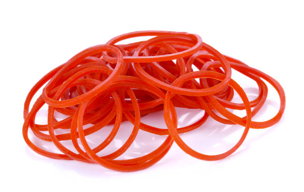 istock rubber red bands fresh, natural colors, beautifully arranged on a white background 1202975963