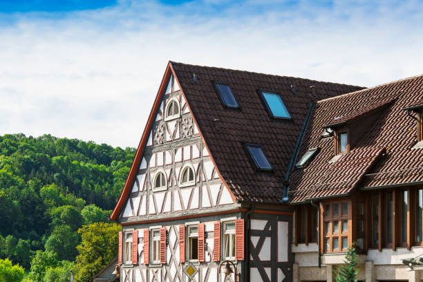 istock White half timbered house with orange shutters in Untermunkheim, Germany 1202976136