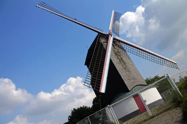 istock The windmill, the sky and the clouds 1202977746