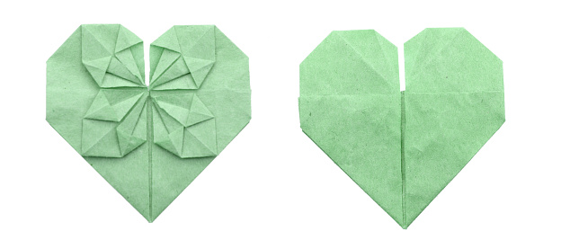 A origami paper heart at front and back side