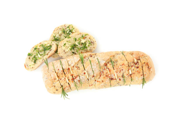 istock Garlic bread with spices isolated on white background 1202979551