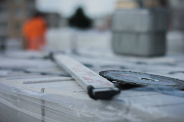 istock Measurement of the curvature using a level ruler 1202981729