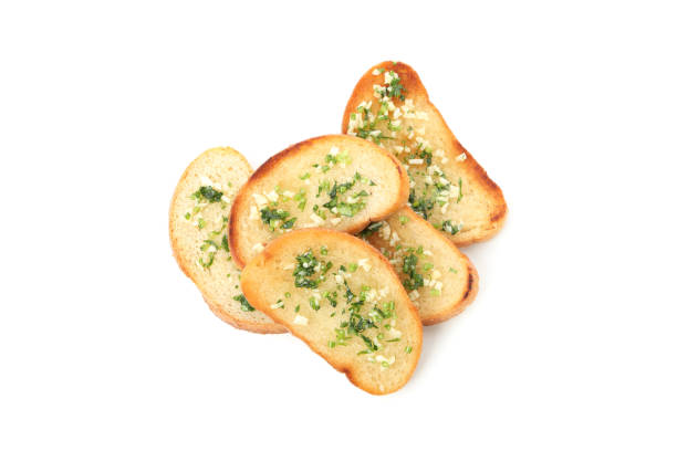 istock Toasted bread slices with garlic isolated on white background 1202982624