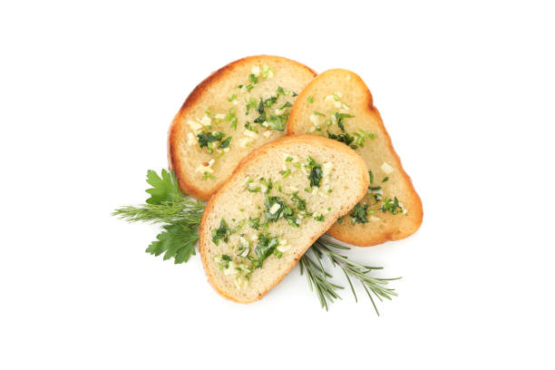 istock Toasted bread slices with garlic isolated on white background 1202982825