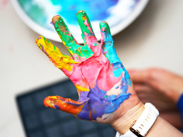 istock Colorful hand paint before print with fun art work 1202983569