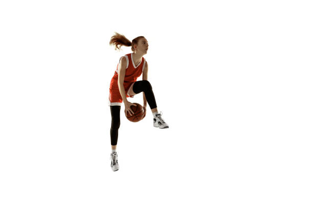 istock Young caucasian female basketball player against white studio background 1202983580