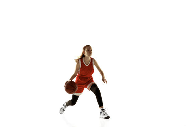 istock Young caucasian female basketball player against white studio background 1202983668
