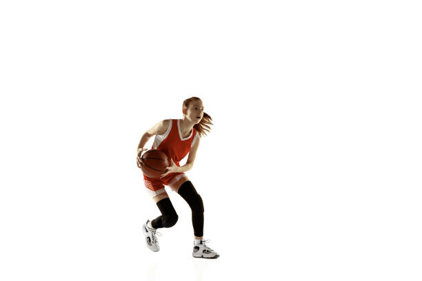 istock Young caucasian female basketball player against white studio background 1202983674