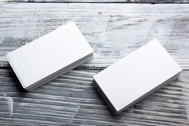 istock Business cards blank. Mockup on color background. Flat Lay. copy space for text 1202985796