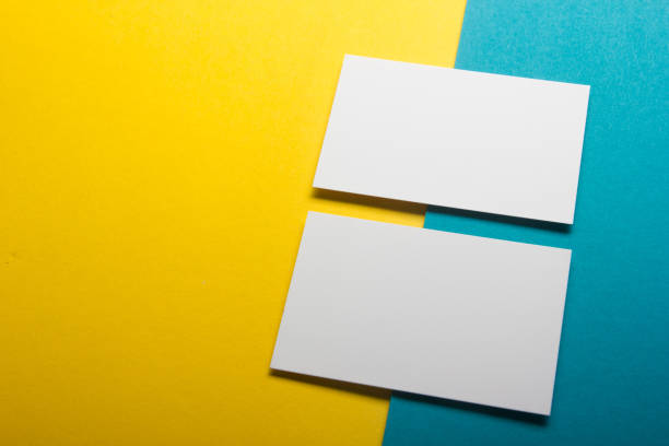 istock Business cards blank. Mockup on color background. Flat Lay. copy space for text 1202985865