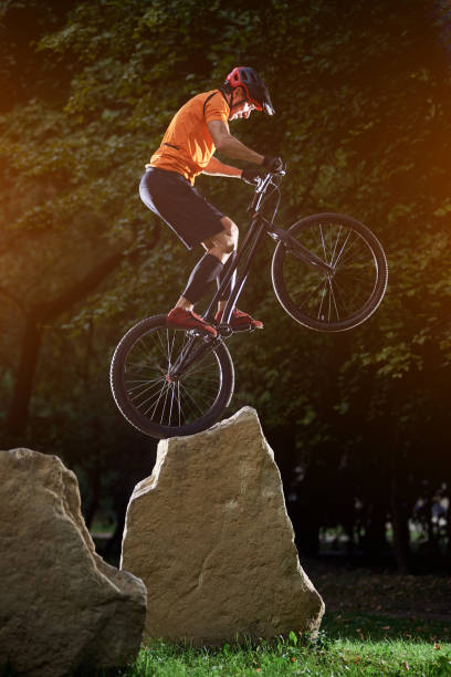 Volgograd, Russia - May 4, 2014:  Young guys playing bike Polo on asphalt upper terrace of the Central embankment