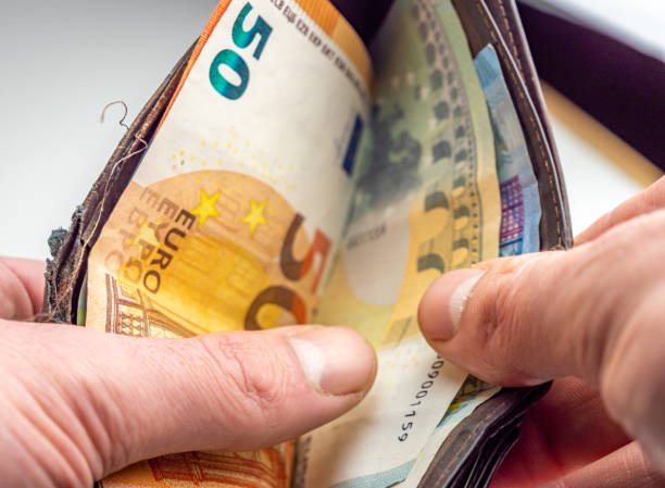 istock Attention counterfeit euro banknotes background 1202988394