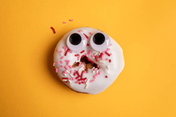 istock Donut With Googly Eyes Upset About Lost Sprinklen 1202989366