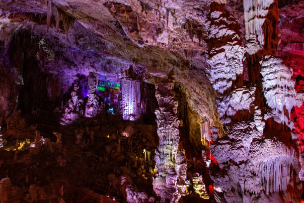 istock Salamander Cave, with multicolored illuminations 1202991095