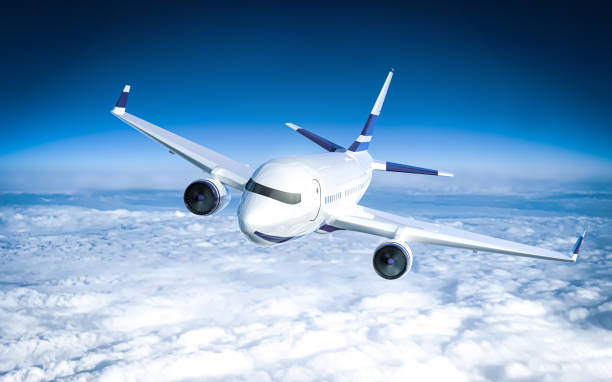 istock Passenger plane close up flying on cruising altitude - above clouds 1202991132