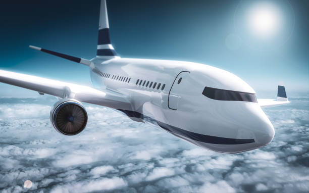 istock Passenger plane close up flying on cruising altitude - above clouds 1202991180