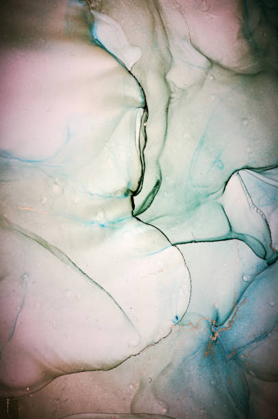 istock Alcohol ink colors translucent. Abstract multicolored marble texture background. Design wrapping paper, wallpaper. Mixing acrylic paints. Modern fluid art. Alcohol Ink Pattern 1202991956