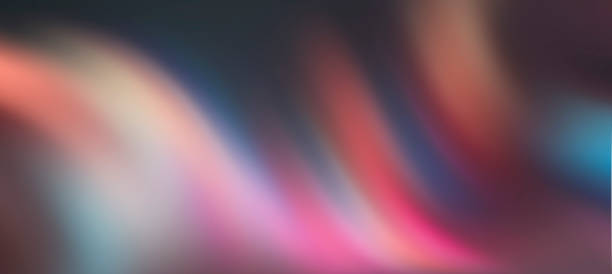 istock Abstract blurred night background. Pink and multi-colored stripes light bokeh 1202997517
