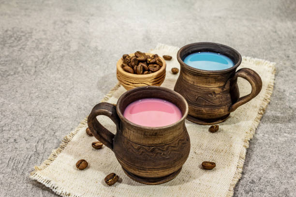 istock Trendy drink blue and pink latte. Lavender or spirulina and rose, beetroot or raspberry coffee. Stone concrete background 1203001351