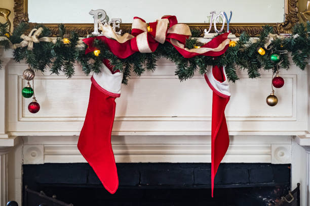 istock A decorated fireplace mantel at Christmas 1203004299
