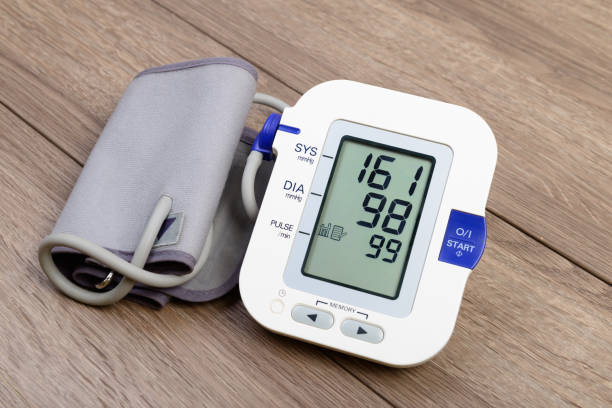 istock automatic blood pressure monitor on wooden table 1203005500