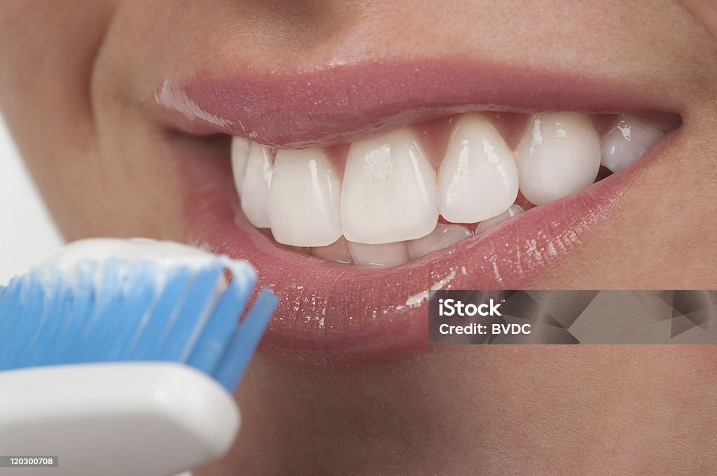 Brushing teeth Adult Stock Photo