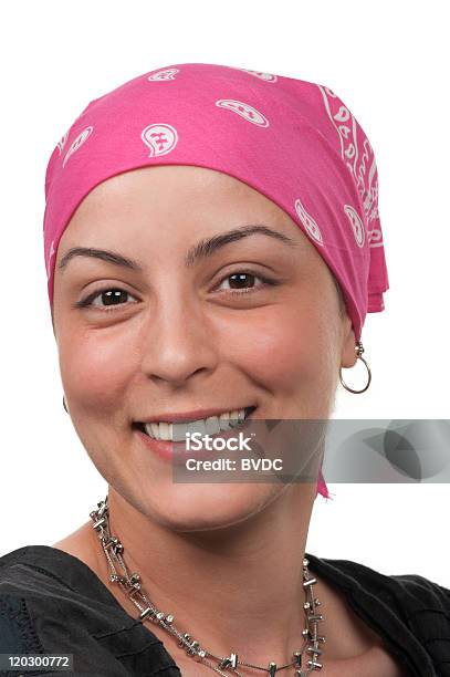 A Smiling Female Cancer Survivor Wearing A Pink Bandanna Stock Photo - Download Image Now