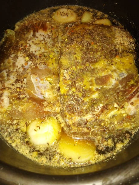 istock baked onions in a sauce with mushrooms 1203007808