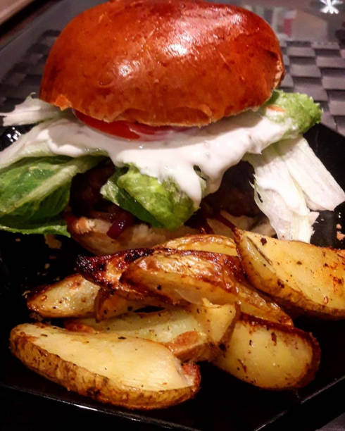 istock a veggie burger with selfmade sauce 1203009289