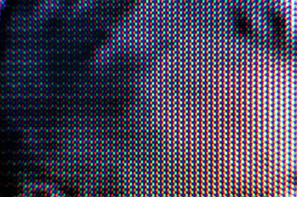 istock abstract background pattern of colored blurry dots on a dark background 1203011151