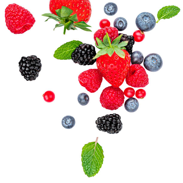 istock Flying Fresh berries isolated on white background, top view. Strawberry, Raspberry, Blueberry and Mint leaf, flat lay 1203011476