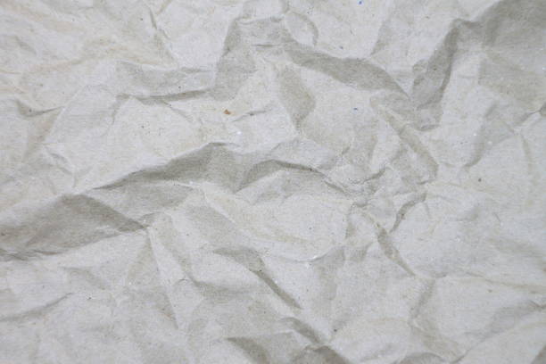 istock Abstract crumpled gray paper highlights for decorative design 1203021572