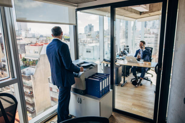 istock Businessmen working together in the office 1203022487
