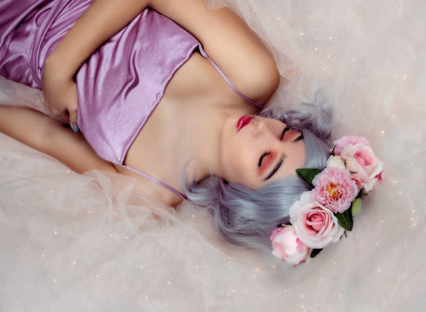 istock Young woman with flower crown 1203024312