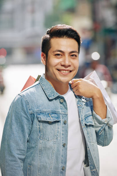 istock Man With Shopping Bags 1203027283