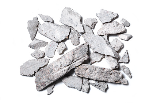Concrete rubble isolated on white background. Top view