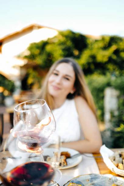 istock Beautiful woman on vacation having lunch 1203034412