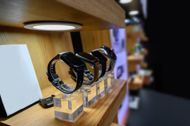 Smart watches on the counter of a electronics store