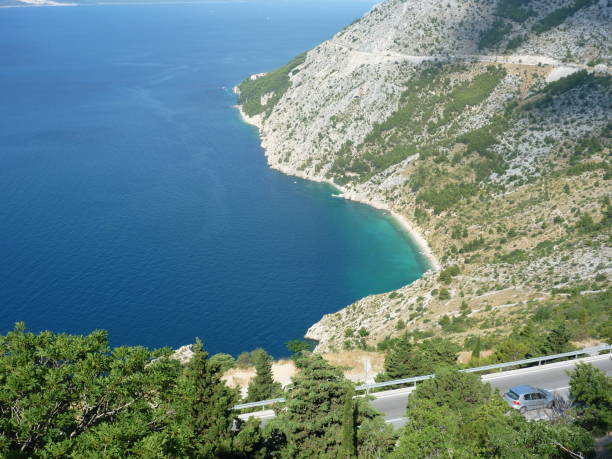 istock Croatia, hills, sea and blue sky 1203037538