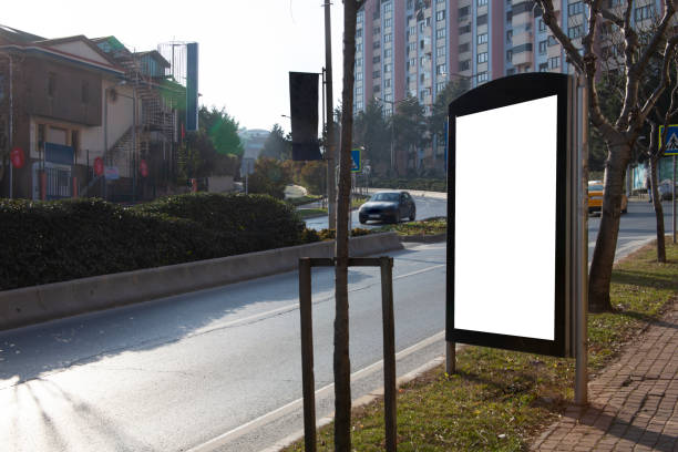 istock advertising board on asphalt road 1203038850
