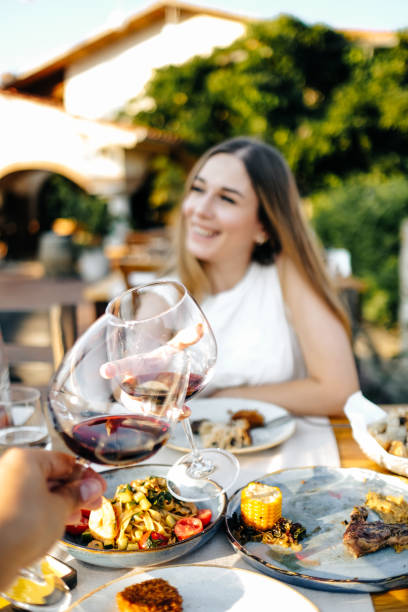istock Beautiful woman on vacation having lunch 1203039173