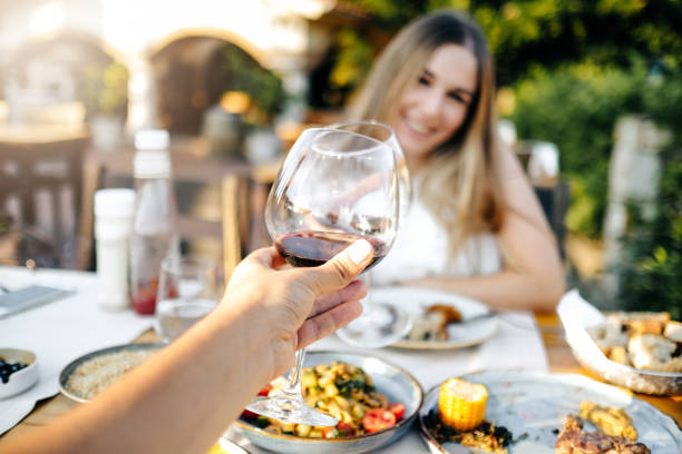 istock Beautiful woman on vacation having lunch 1203039260