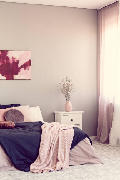 istock Round velvet pillow on king size bed with cozy bedding 1203040109