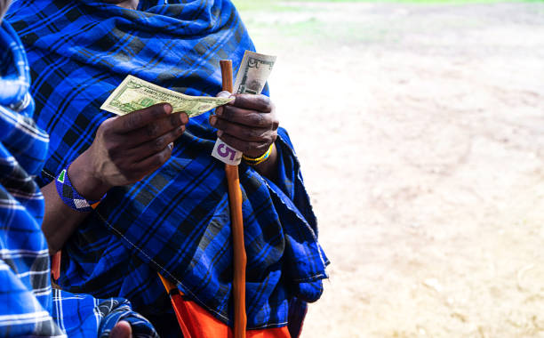 African man counting money, counting dollars. Close up.