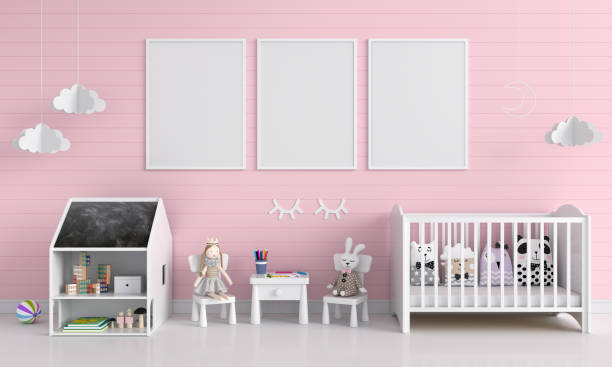 istock Three blank photo frame for mockup in pink child room 1203044116