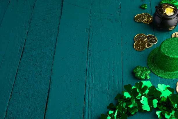 istock St. Patrick's Day celebration, on green wooden background, top view 1203045544