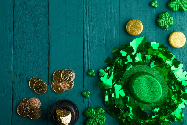 istock St. Patrick's Day celebration, on green wooden background, top view 1203045801