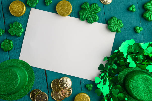 istock Flat lay, St. Patrick's Day, white card for congratulation. March 17, on a green background with accesories for a celebration, a traditional Irish holiday 1203046400