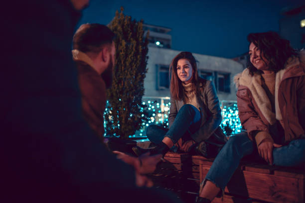 istock Friends Enjoying The Chilly Night Air Outside 1203046900