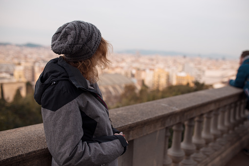 Woman tourist watching the cityscape